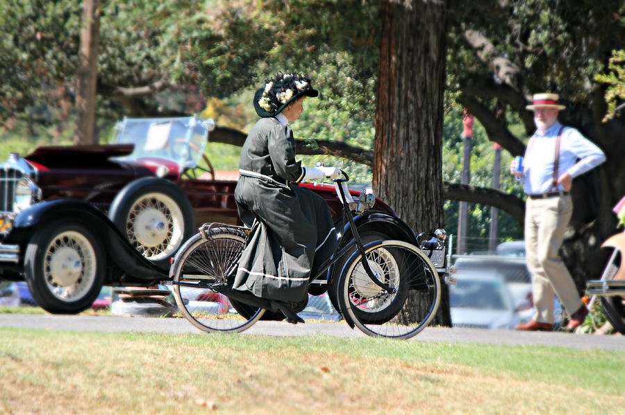 Victorian Lady on Bicycle Photograph by Steve Natale