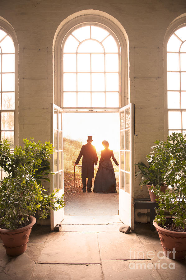 Victorian Man And Woman Leaving A Conservatory Photograph by Lee Avison