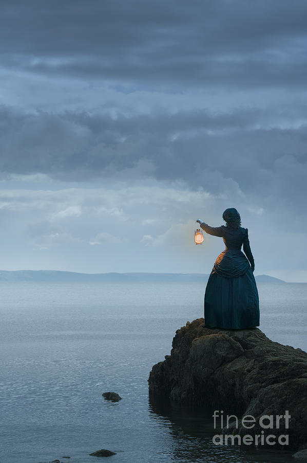 Lantern Still Life Photograph - Victorian Woman Holding An Oil Lamp Facing The Sea by Lee Avison