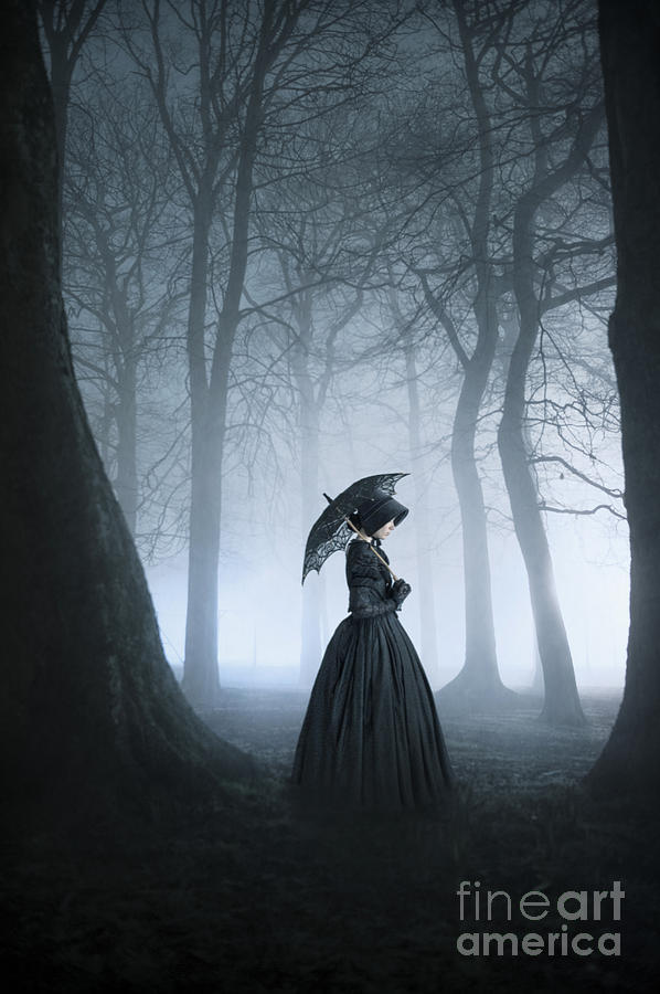 Victorian Woman In Black Mourning Dress Alone In A Dark Foggy Fo Photograph by Lee Avison
