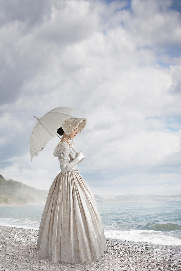 Victorian Woman On A Shingle Beach Photograph by Lee Avison