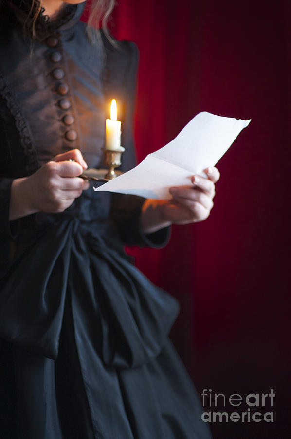 Victorian Woman Reading A Letter By Candle Light Photograph by Lee Avison
