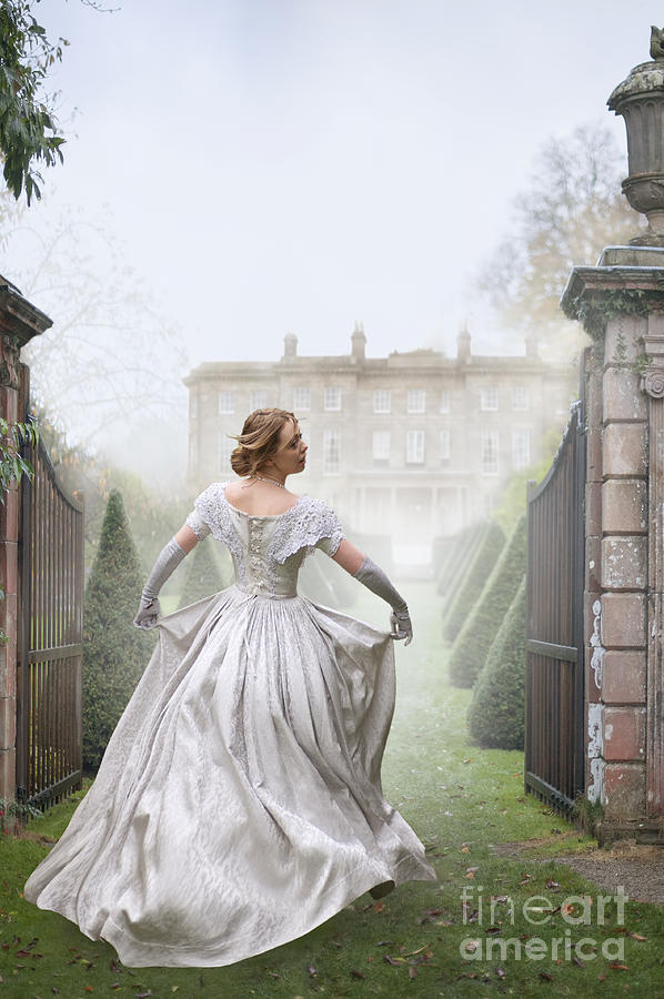 Victorian Woman Running Towards A Mansion House Photograph by Lee Avison