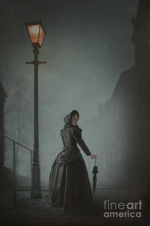 Victorian Woman Under Streetlamp In Fog Photograph by Lee Avison