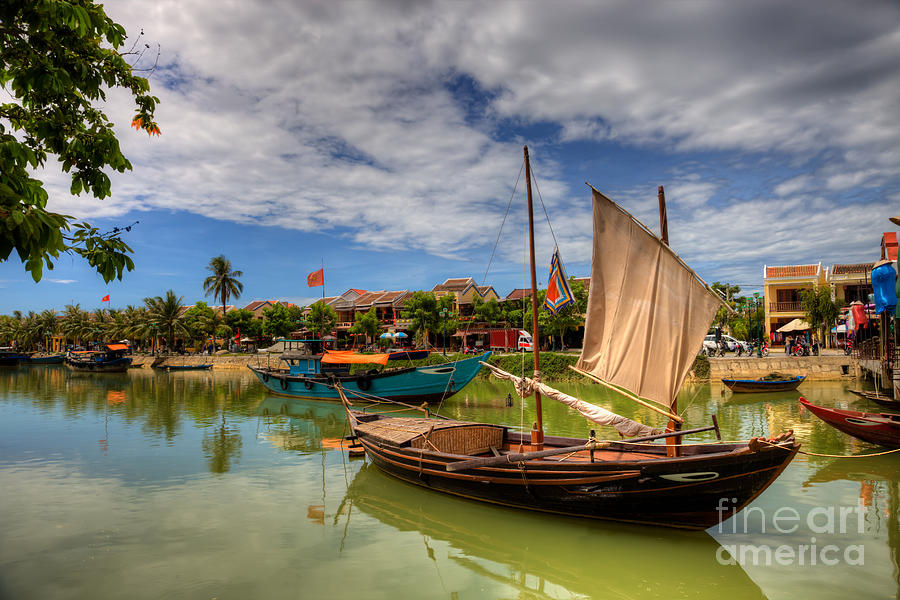 Holiday Photograph - Vietnamese fishing boats and ancient city of Hoi An Vietnam by Fototrav Print
