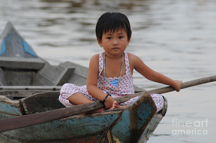 Vietnamese Girl on Lake Tonle Sap Photograph by Vivian Christopher