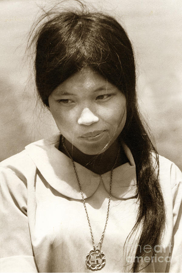 Vietnamese Photograph - Vietnamese girl with Buddhist cross  necklace  1968 by Monterey County Historical Society