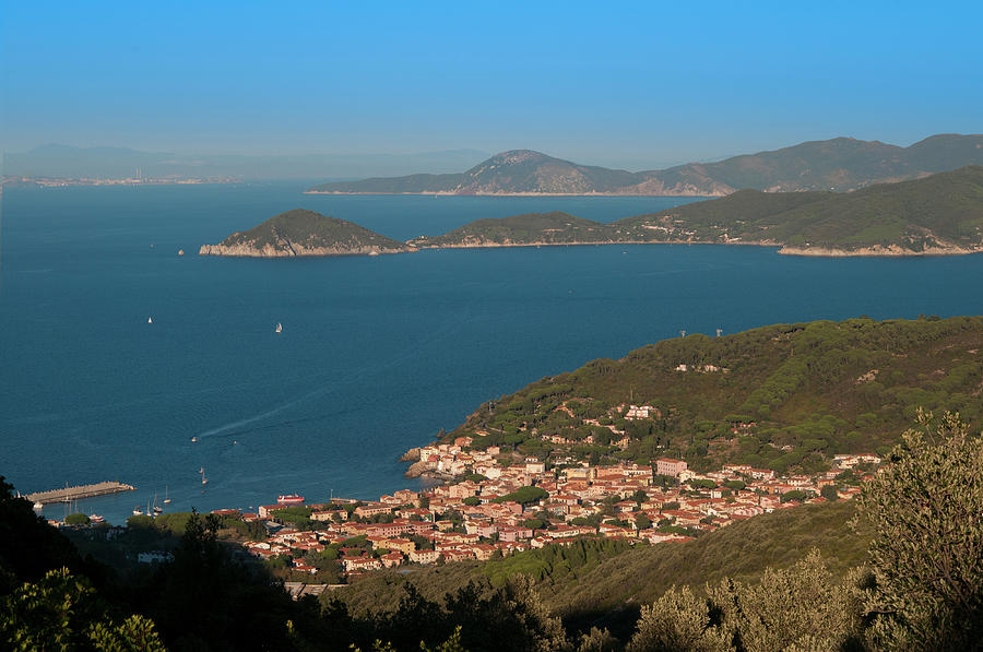 View At A Bay And The Town Of Marciana Photograph by Paolo Negri