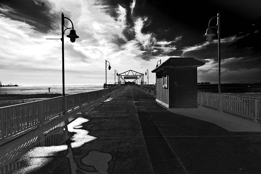 View Down the Pier Photograph by Joseph Hollingsworth