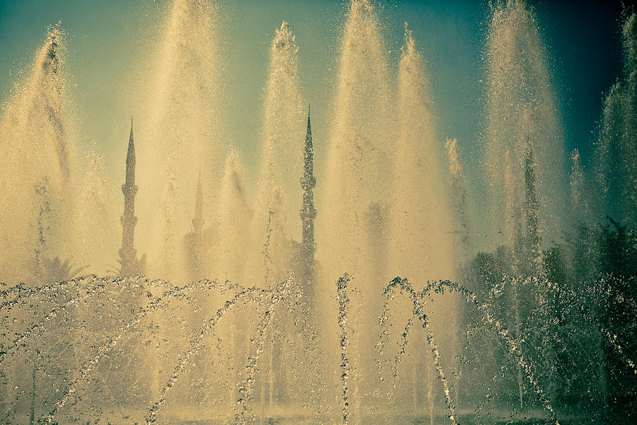 view frou fountain Silhouettes of Blue Mosque Photograph by Raimond Klavins