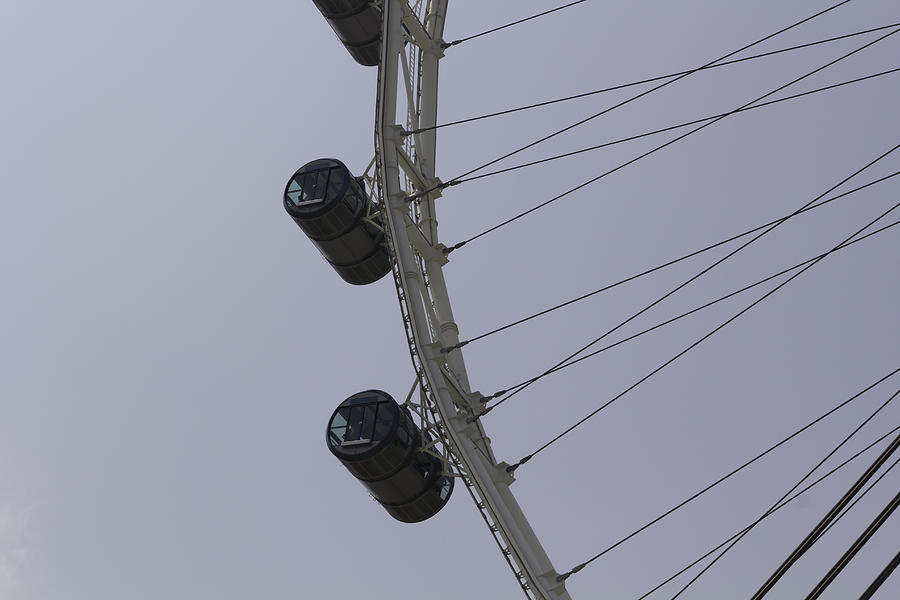 View of 3 capsules of the Singapore Flyer along with the spokes Photograph by Ashish Agarwal