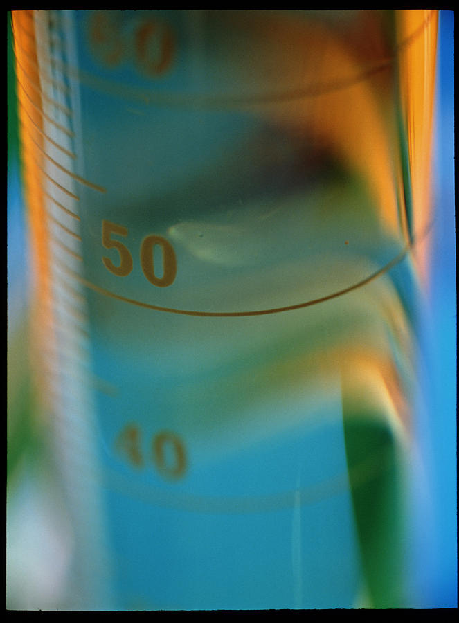 View Of A Measuring Cylinder Photograph by Chris Knapton/science Photo Library