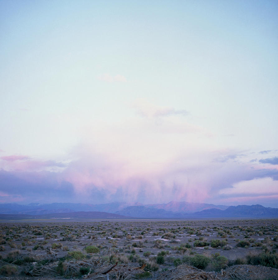 View Of Distant Rainfall Over Death Valley Photograph by Rev. Ronald
