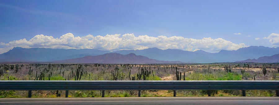 View Of Empty Road In Front Of Mountains Against Blue Sky Photograph by Jesse Coleman / EyeEm View Of Empty Road In Front Of Mountains Against Blue Sky Photograph by Jesse Coleman / EyeEm