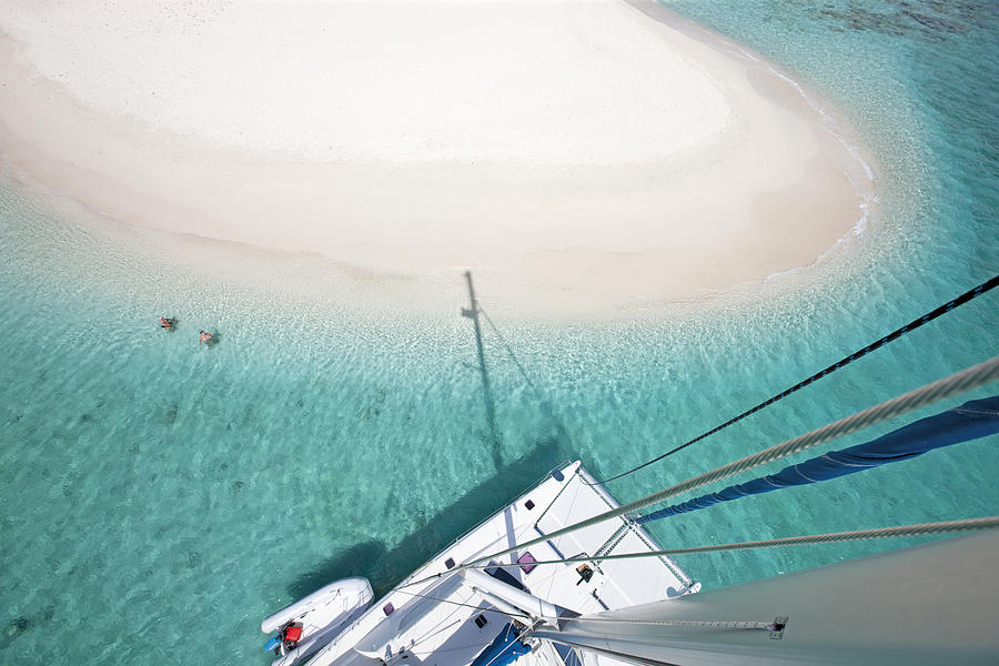 view of Sandy Spit, BVI from the catamarans mast Photograph by Cdwheatley