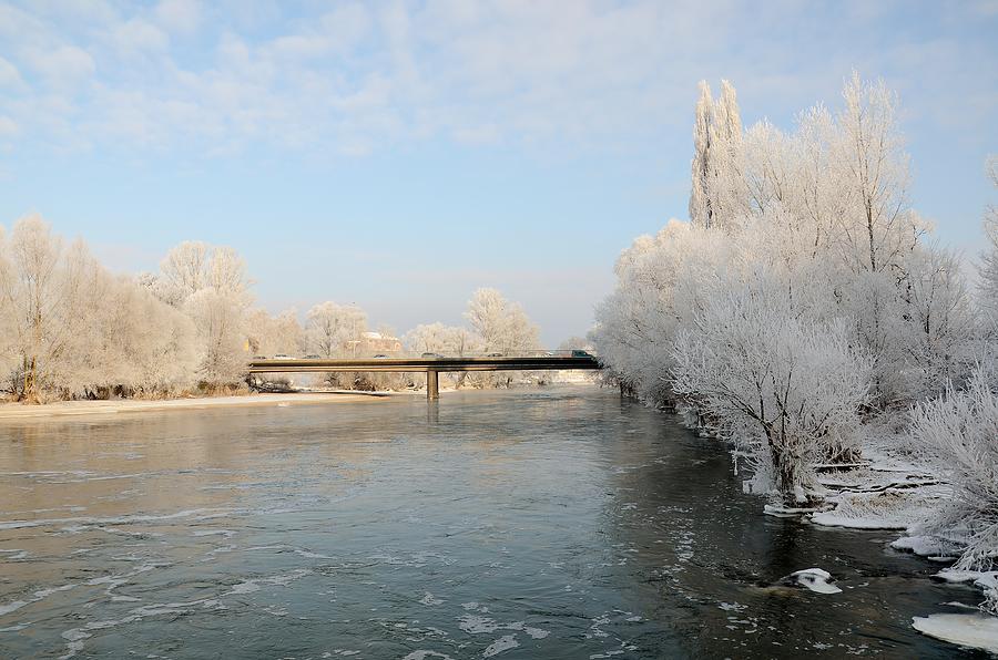 Winter Photograph - View of the river and bridge by Gynt  
