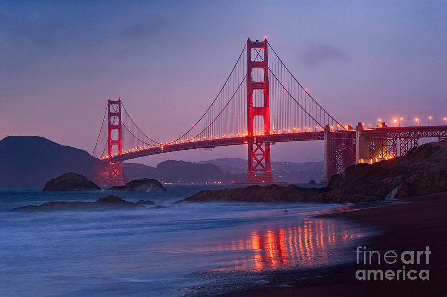 View Of World Famous Golden Gate Bridge From Baker Beach In San Francisco At Twilight Night
