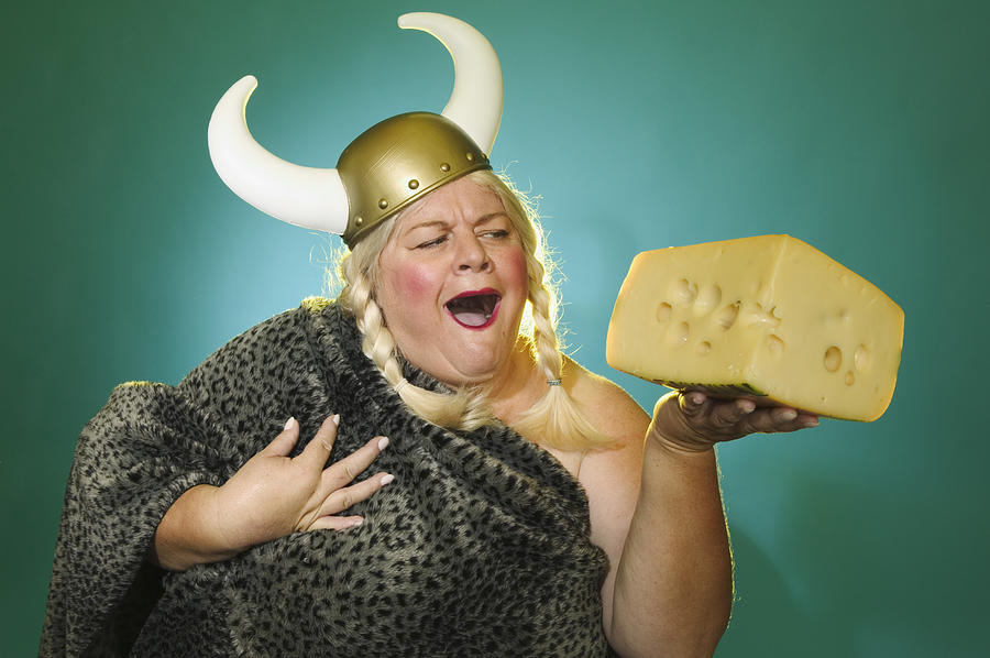 [Image: viking-woman-holding-a-huge-brick-of-che...-photo.jpg]