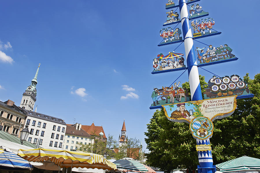 Viktualienmarkt, Munich with its maypole Photograph by Simon Katzer