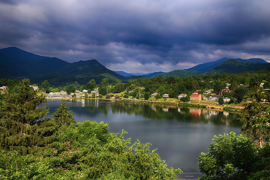 Village by the lake Photograph by Dennis Baswell