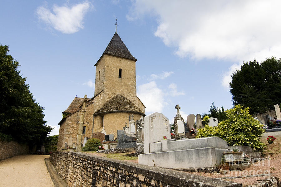 Village church and cemetery in France Photograph by Patricia Hofmeester