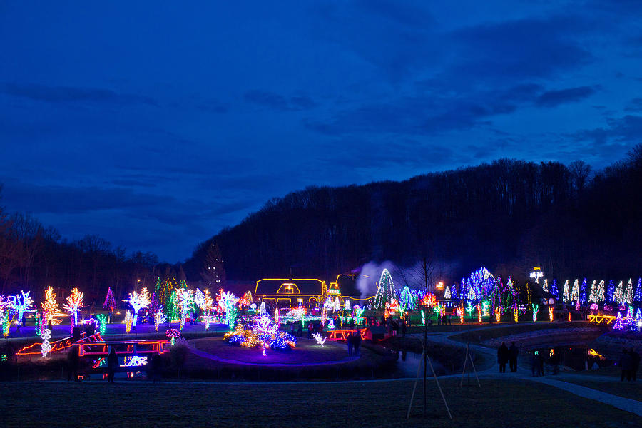 Village in Christmas lights blue hour view Photograph by Brch Photography