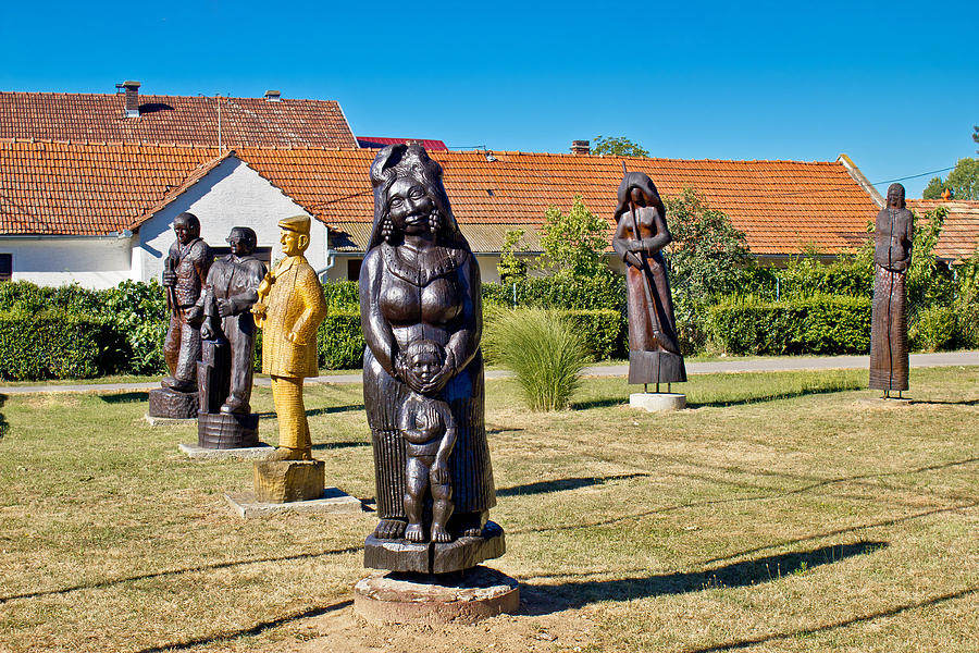 Village of Hlebine wooden statues Photograph by Brch Photography