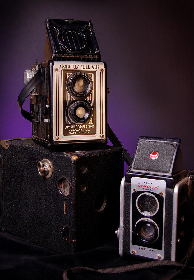 Vintage Cameras Stacked Photograph