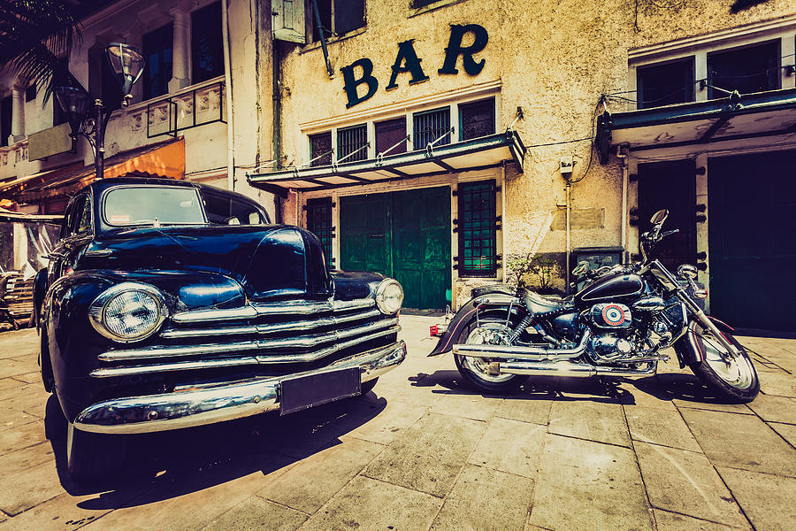 Vintage Car (Chevrolet) and Motorbike in Jakarta, Indonesia Photograph by Zodebala