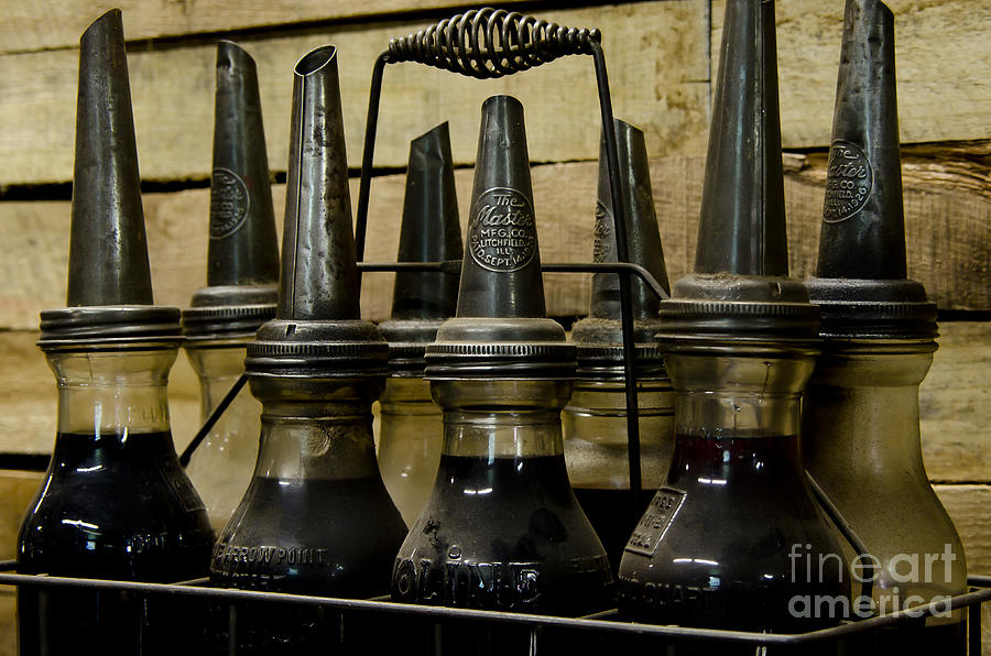 Vintage Glass  Motor Oil Bottles Photograph by Wilma  Birdwell