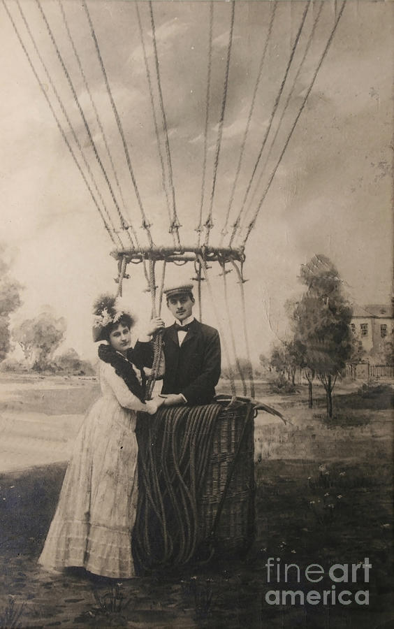 Vintage loving  couple and air balloon Photograph by Patricia Hofmeester