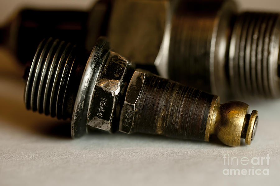 Vintage Motorcycle Spark Plugs Photograph by Wilma  Birdwell