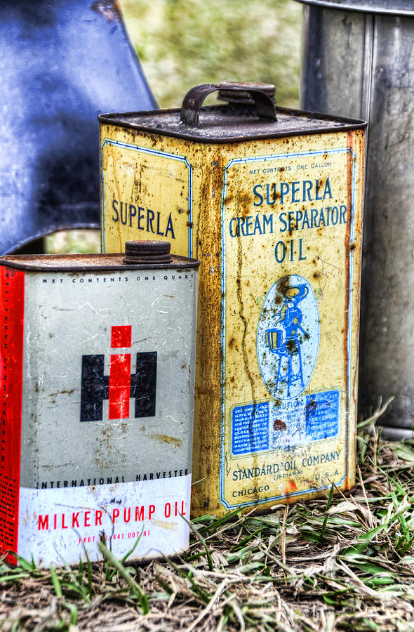 Vintage Oil Cans on the Farm Photograph by Ken Smith