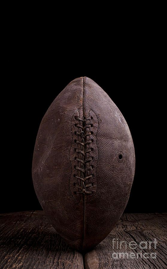 Vintage old leather football Photograph by Edward Fielding