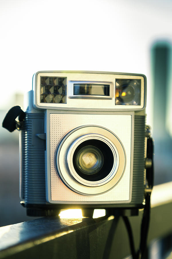Vintage Pocket Camera With Skyline Photograph by Hal Bergman