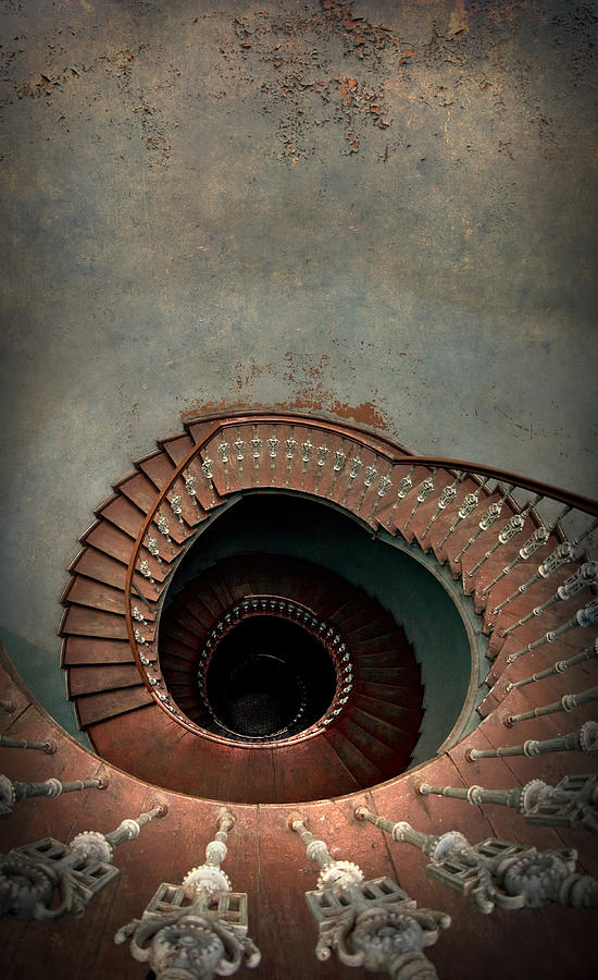 Vintage Photograph - Vintage spiral staircase with ornamented handrail by Jaroslaw Blaminsky