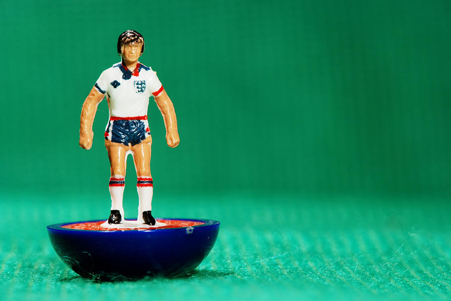 Vintage Subbuteo soccer player miniature toy Photograph by Ilbusca