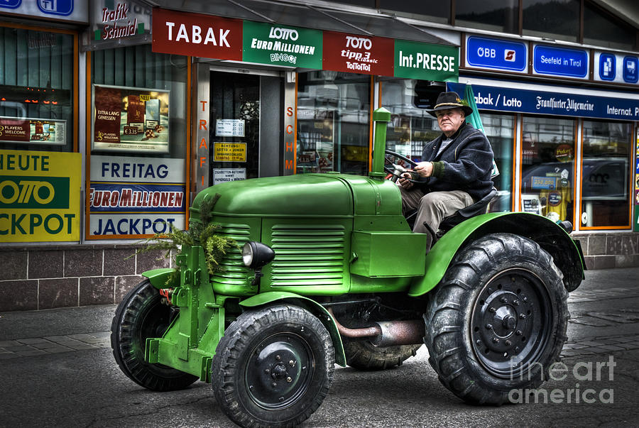 Vintage tractor on market day Photograph by Dan Yeger