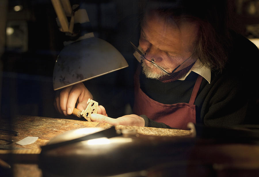Violin Maker At Work In His Studio Photograph by Kathrin Ziegler