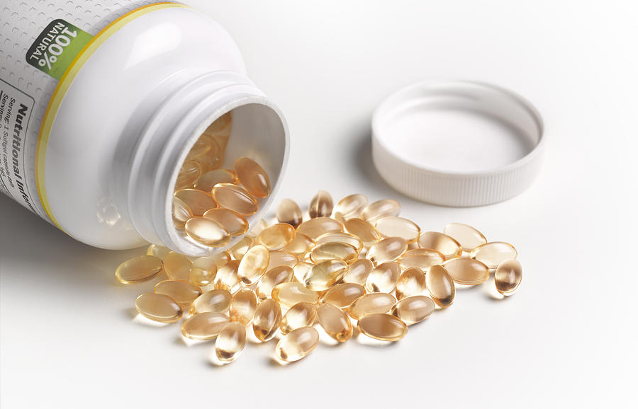 Vitamin D capsules tablets Photograph by Peter Dazeley