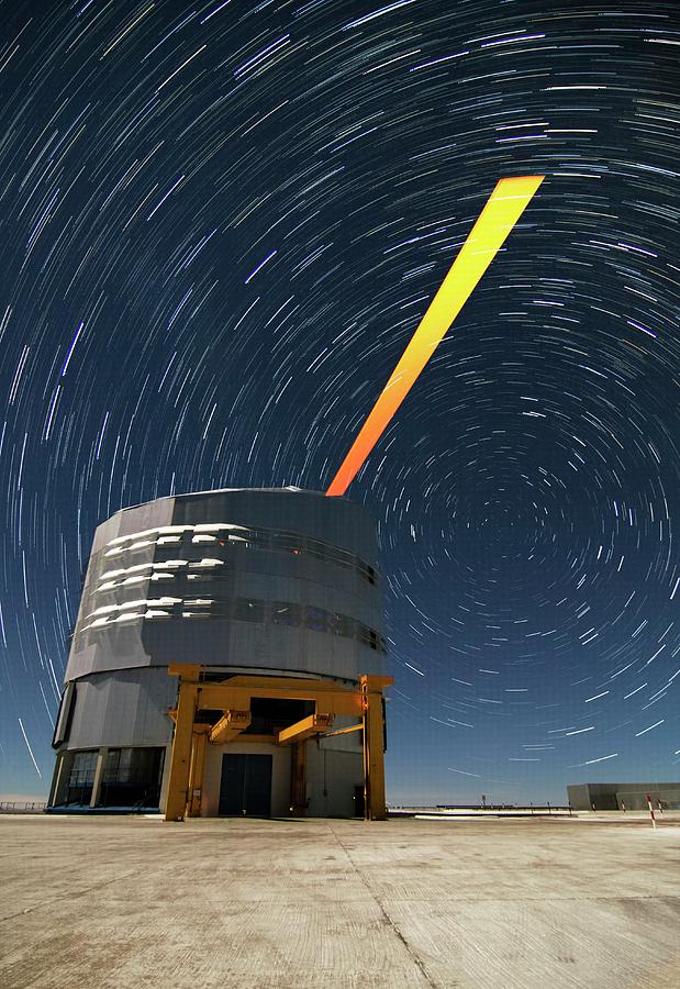Telescope Photograph - Vlt And Laser Guide Under Star Trails by Dave Jones/eso