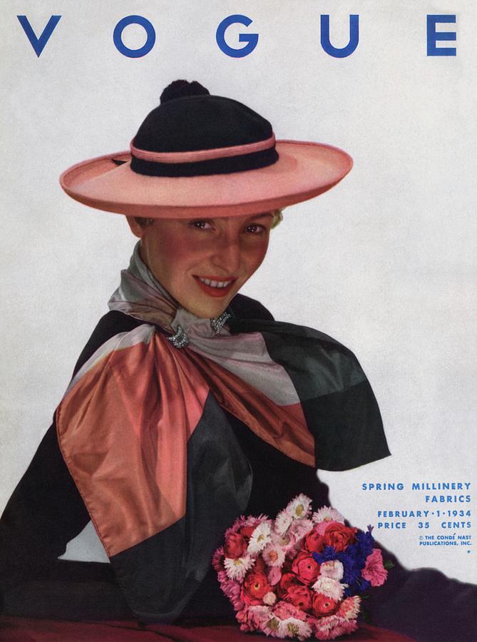 Vogue Magazine Cover Featuring A Model Wearing Photograph by George Hoyningen-Huene