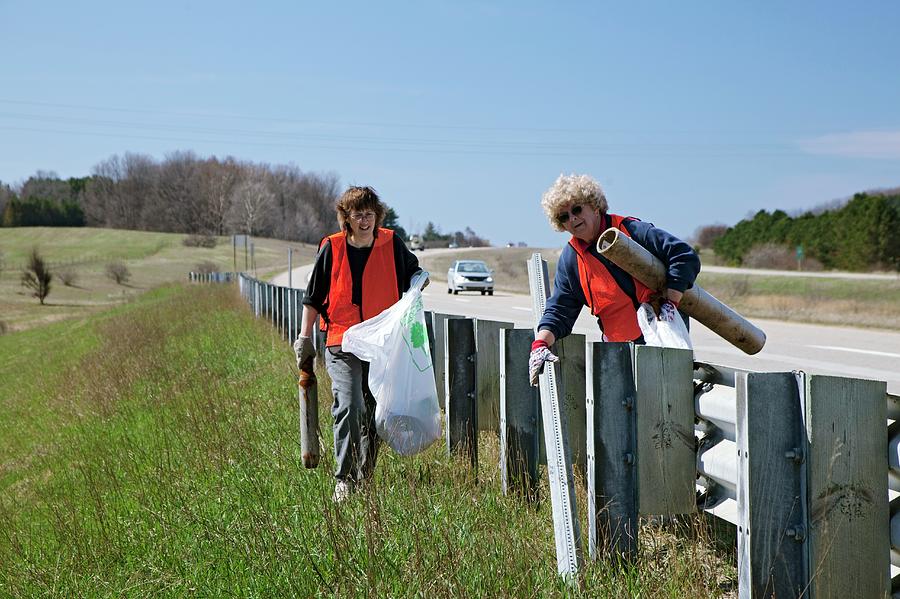 Volunteers Clearing Roadside Litter Photograph by Jim West