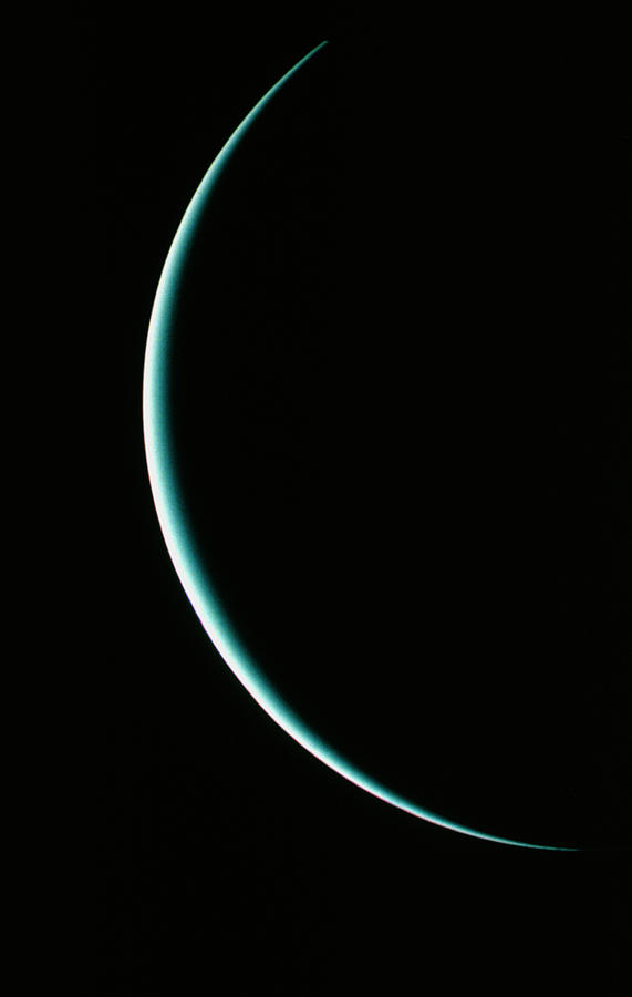 Voyager 2 Image Of A Crescent Uranus Photograph by Nasa/science Photo Library