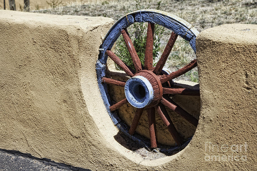 Wagon Wheel Wall Photograph by Timothy Hacker