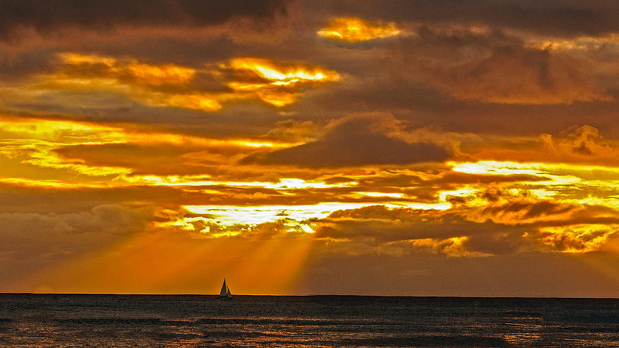 Waikiki sun set Photograph by John Johnson