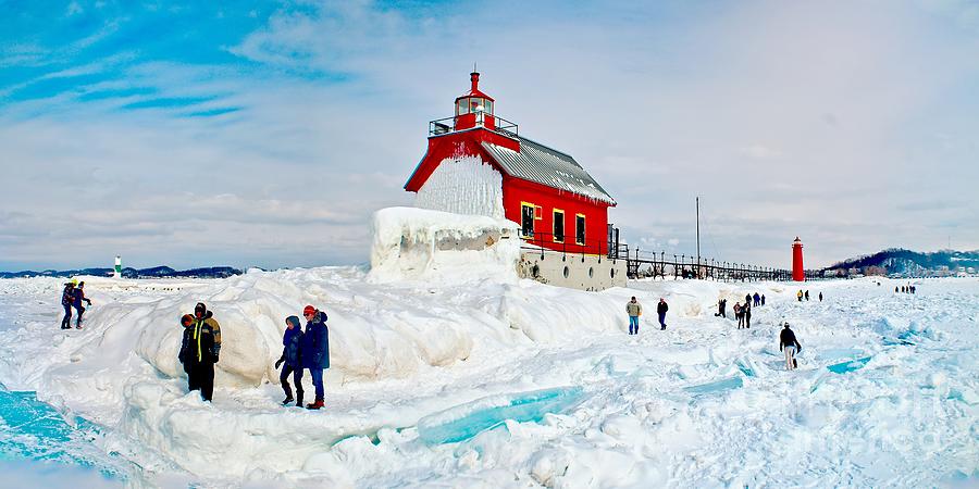 Walk on the Ice in Grand Haven Photograph by Nick Zelinsky Jr
