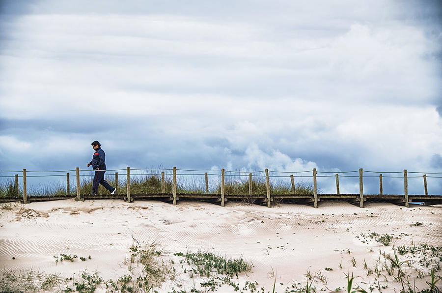 Walk over the dunes Photograph by Paulo Goncalves