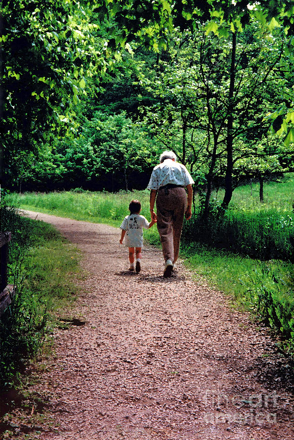 Walk with Grandma Photograph by Karen Adams