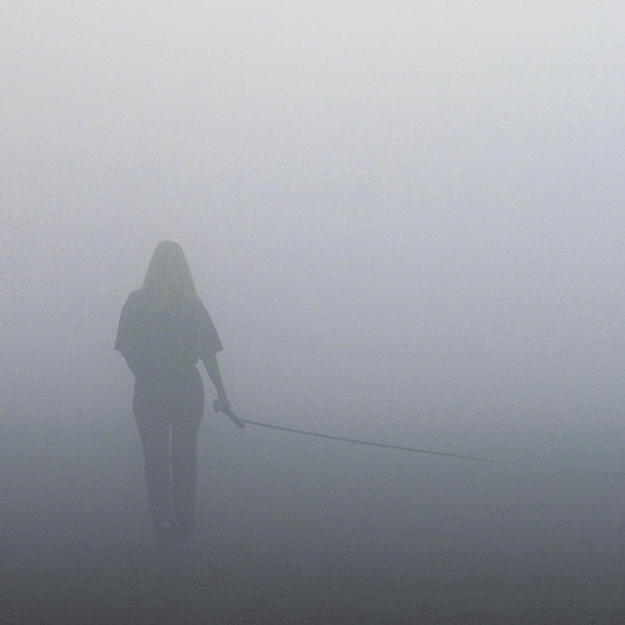 Walkin the Fog Photograph by Rick Shea